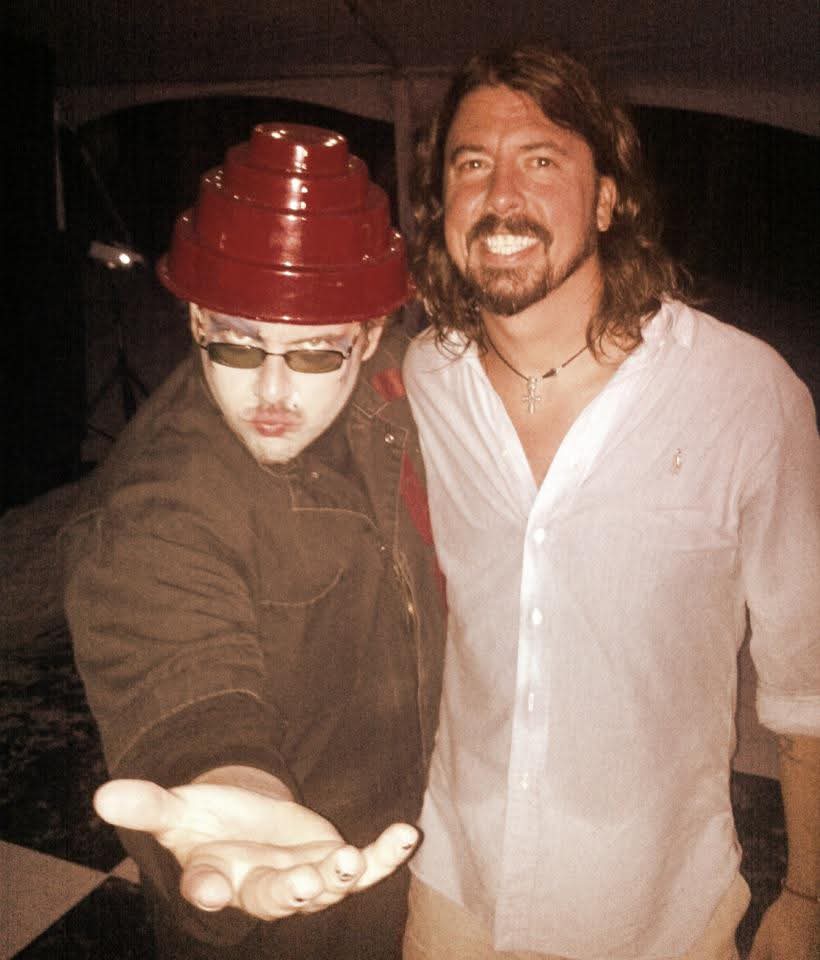 Jack Miele wearing a DEVO Energy Dome hat with Dave Grohl